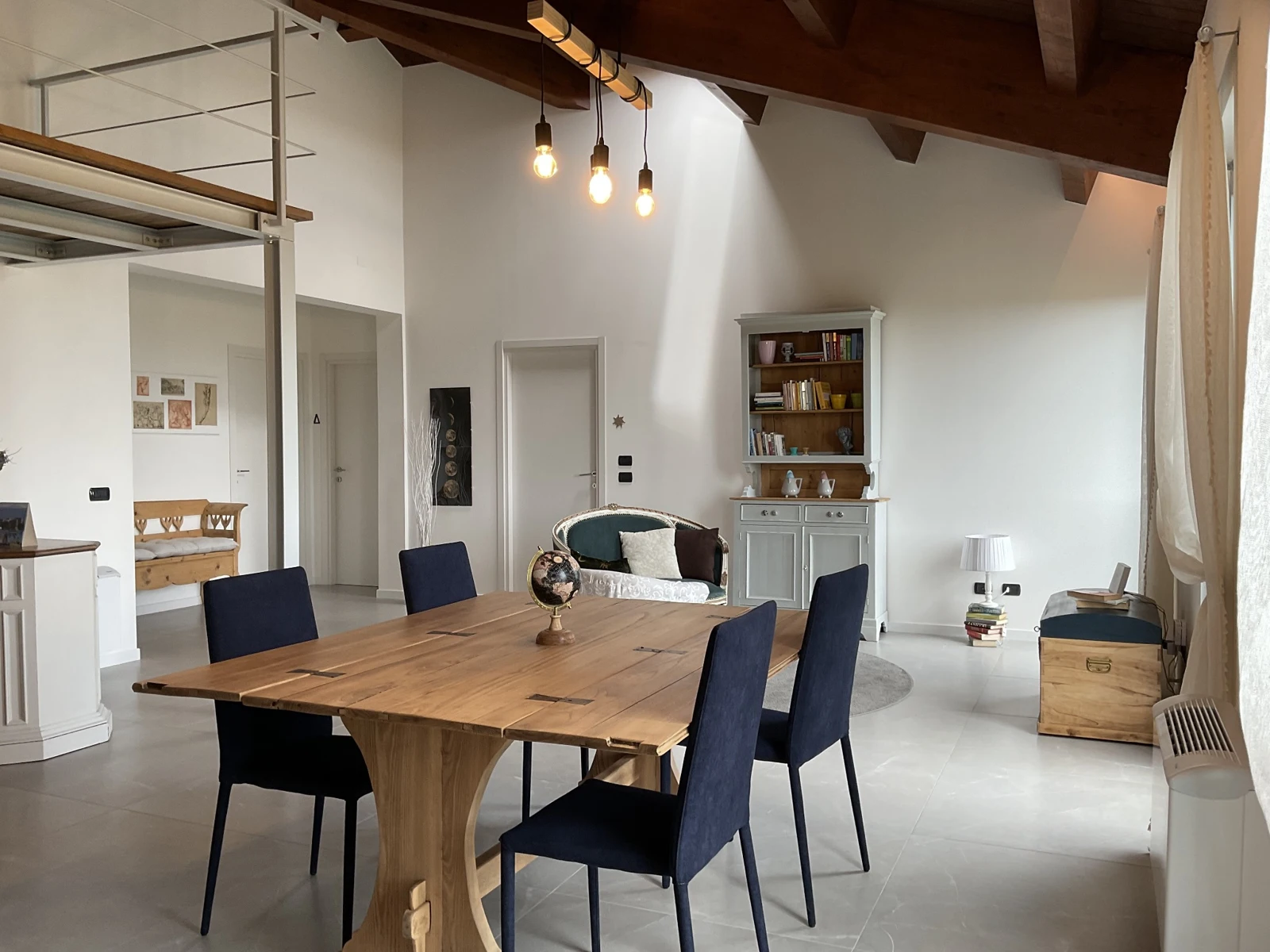 Wooden dining table and furnishings in the shared space